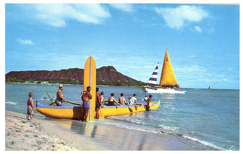 Yellow outrigger canoe - &, sail